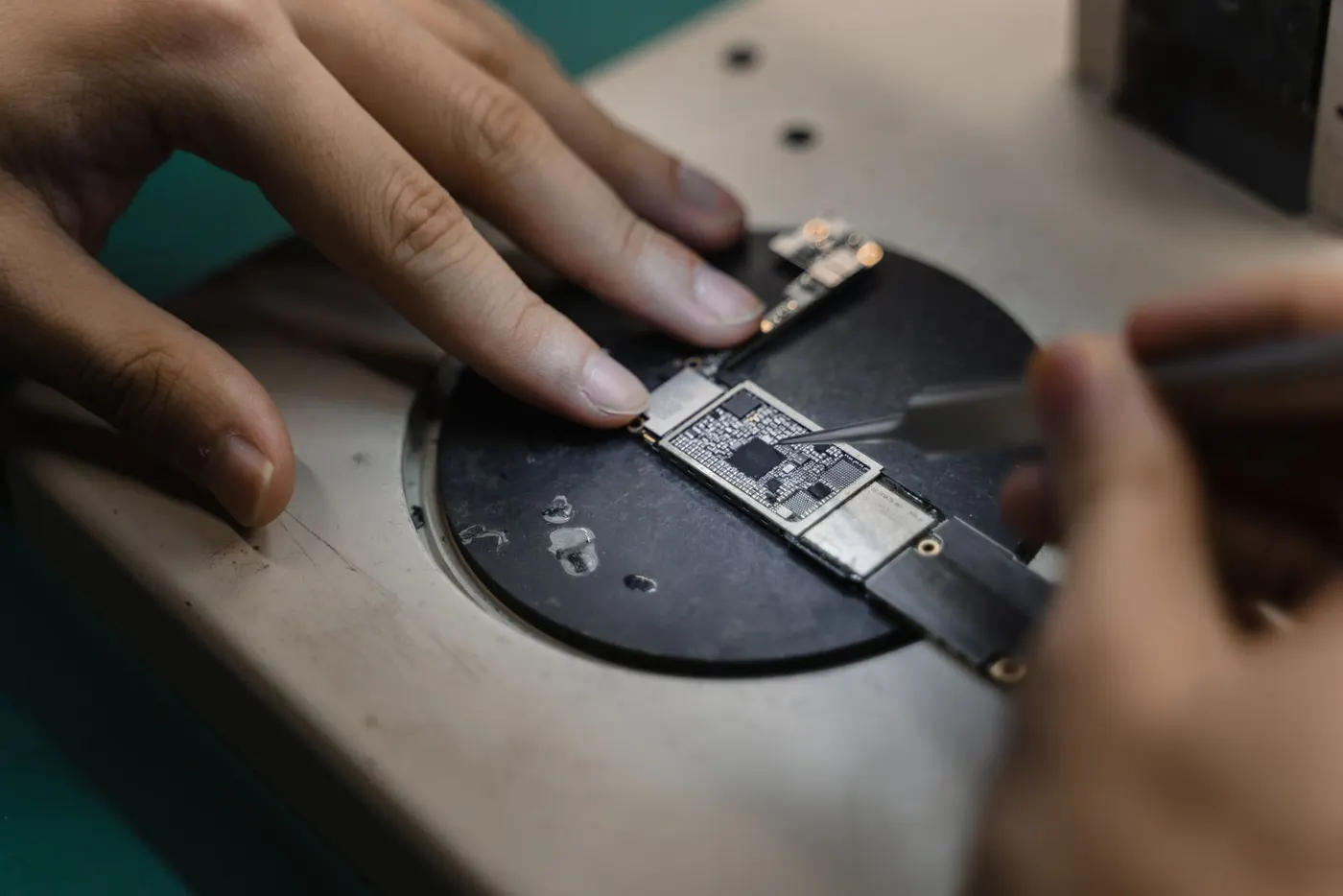 Micro-soldering work on a small circuit board
